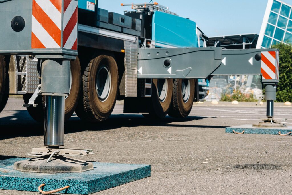 Boom truck hazard awareness: Inspect lifting hooks, cables, and pulleys before each lift to ensure boom truck safety on site.